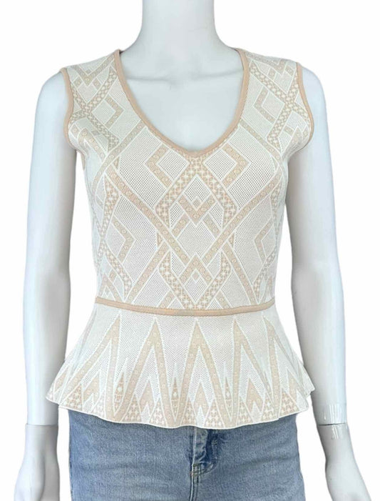 sleeveless peplum sweater